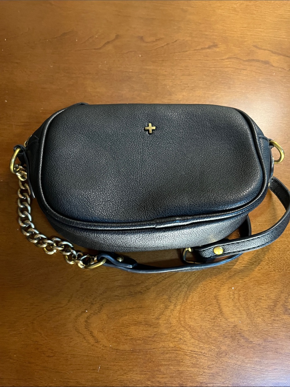 PETA + JAIN Black Leather Crossbody Bag with Gold Chain Accent